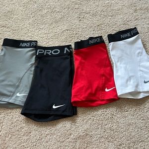 4 pairs of Nike Pro Spandex
